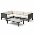 Canapé d'angle extérieur en aluminium avec coussins beiges et table basse - 2026
