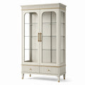Vitrine ivoire en bois et verre avec détails dorés, 2 portes, 2 tiroirs et 3 tablettes, 100 × 42 × 190 cm - 2026