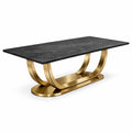 Table à manger en marbre noir avec base en acier doré - 2026