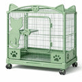 Cage à chat en métal vert avec roulettes - 2026