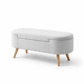 Banc de rangement en tissu écru avec pieds en bois - 2026