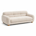 Canapé trois places en tissu bouclé beige avec pieds en bois - 2026